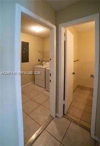 8818 SW 113th Place Circle E ., Miami, FL 33176