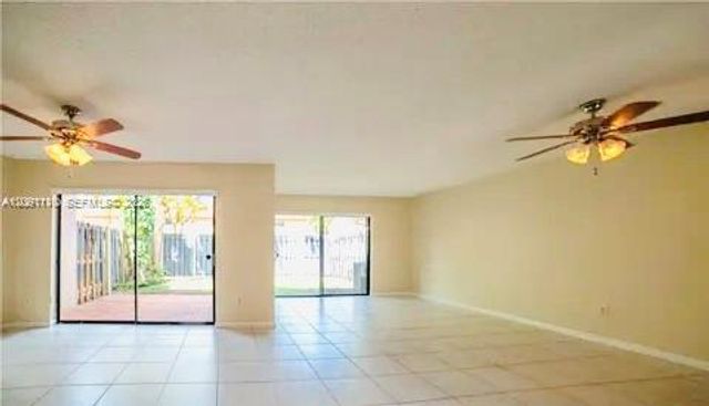 8818 SW 113th Place Circle E ., Miami, FL 33176