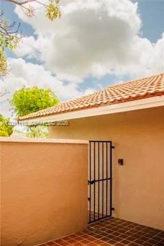 8818 SW 113th Place Circle E ., Miami, FL 33176