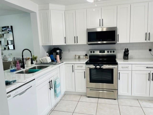 8818 SW 113th Place Circle E ., Miami, FL 33176