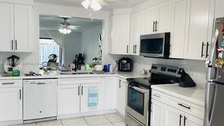 8818 SW 113th Place Circle E ., Miami, FL 33176