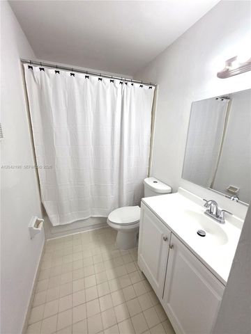 14237 SW 94th Cir Ln 103, Miami, FL 33186