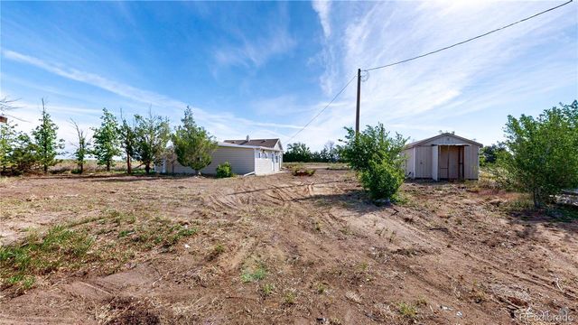 309 Emerald Street, Wiggins, CO 80654