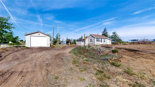 309 Emerald Street, Wiggins, CO 80654