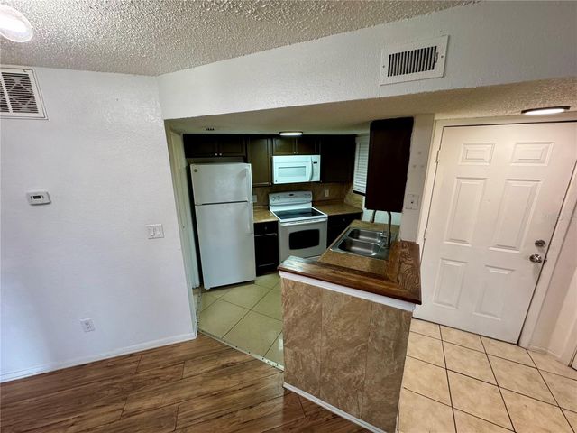 1948 LAKE ATRIUMS CIRCLE 119, Orlando, FL 32839