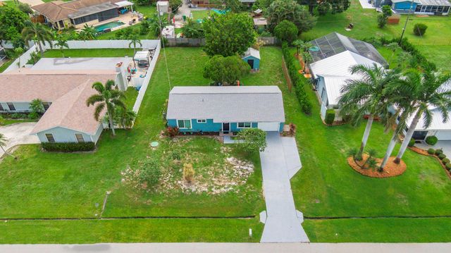 1261 SE Ladner Street, Port St Lucie, FL 34983