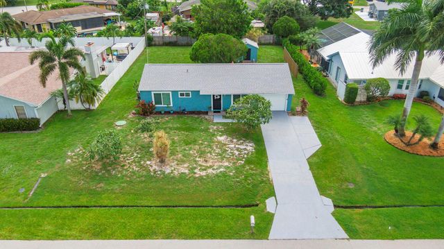 1261 SE Ladner Street, Port St Lucie, FL 34983