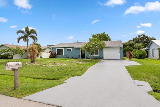 1261 SE Ladner Street, Port St Lucie, FL 34983