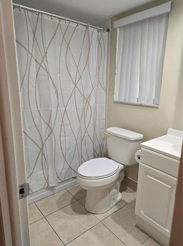 8590 Sunrise Lakes Boulevard 106, Sunrise, FL 33322