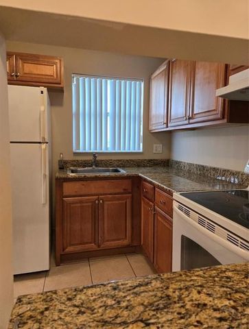 8590 Sunrise Lakes Boulevard 106, Sunrise, FL 33322