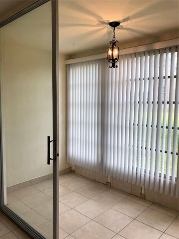 8590 Sunrise Lakes Boulevard 106, Sunrise, FL 33322