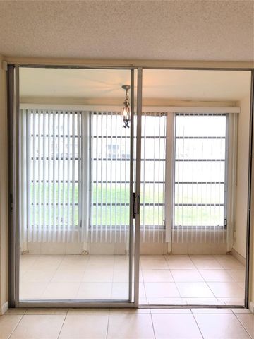 8590 Sunrise Lakes Boulevard 106, Sunrise, FL 33322