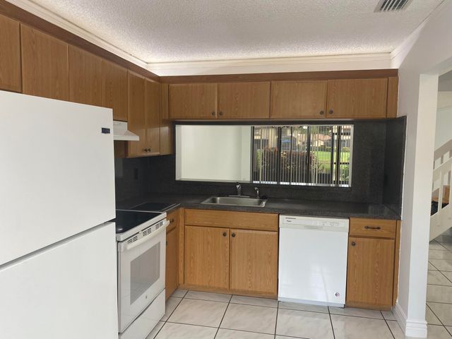 3961 Cocoplum Circle F, Coconut Creek, FL 33063