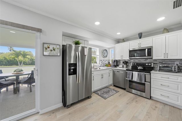 1120 SE 23RD TERRACE, Cape Coral, FL 33990