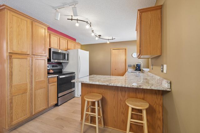 10007 Pleasure Creek Circle NE, Blaine, MN 55434