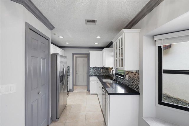 21583 Villa Nova Drive, Boca Raton, FL 33433