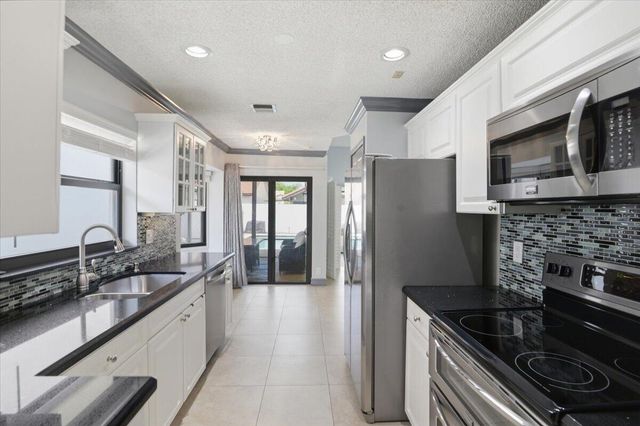 21583 Villa Nova Drive, Boca Raton, FL 33433