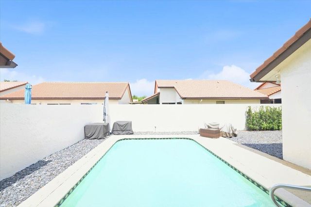 21583 Villa Nova Drive, Boca Raton, FL 33433