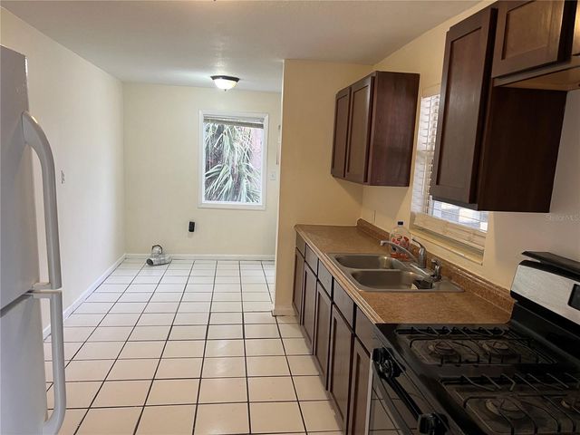 1112 DICKENS AVENUE, Orlando, FL 32809