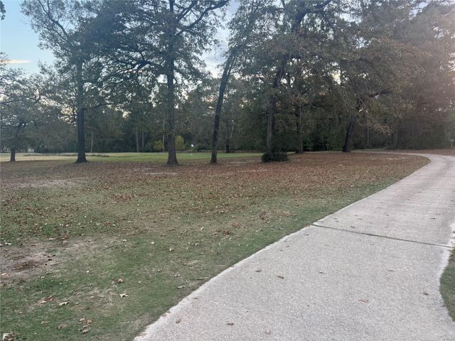 26680 Pools Creek Drive, Huntsville, TX 77320