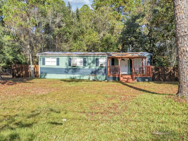 9028 Larker Woods Drive, Navarre, FL 32566