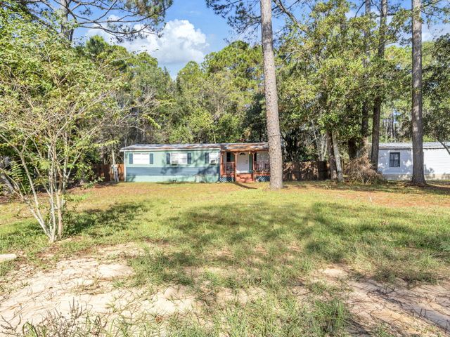 9028 Larker Woods Drive, Navarre, FL 32566