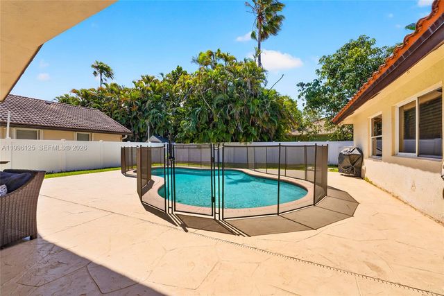 9836 NW 48th Ct, Coral Springs, FL 33076