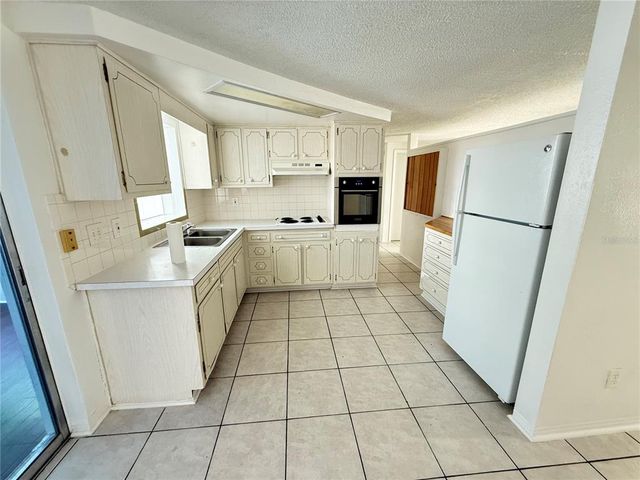4233 DARLINGTON ROAD, Holiday, FL 34691