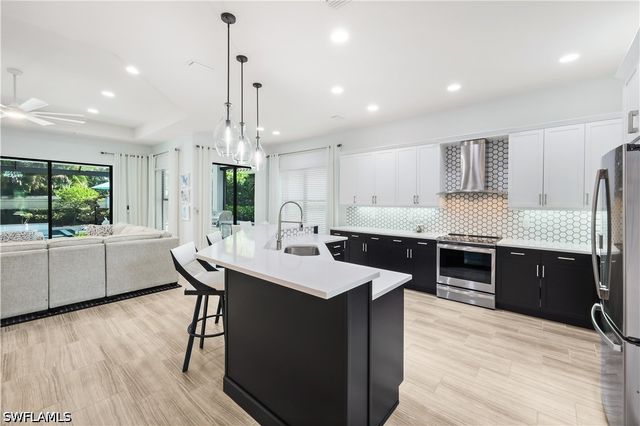 13836 Luna DR, Naples, FL 34109