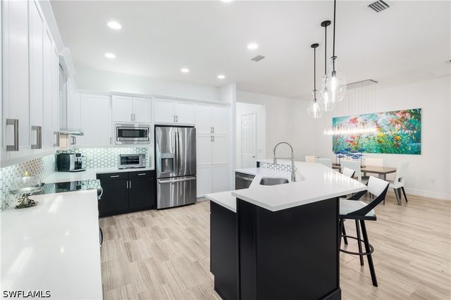 13836 Luna DR, Naples, FL 34109