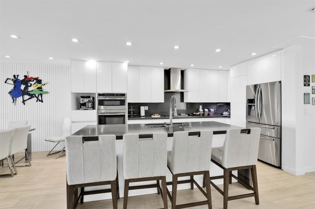 1035 Boca Cove Lane, Highland Beach, FL 33487