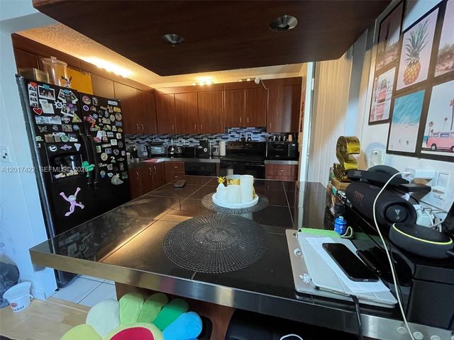 671 NE 195th St 207-E, Miami, FL 33179