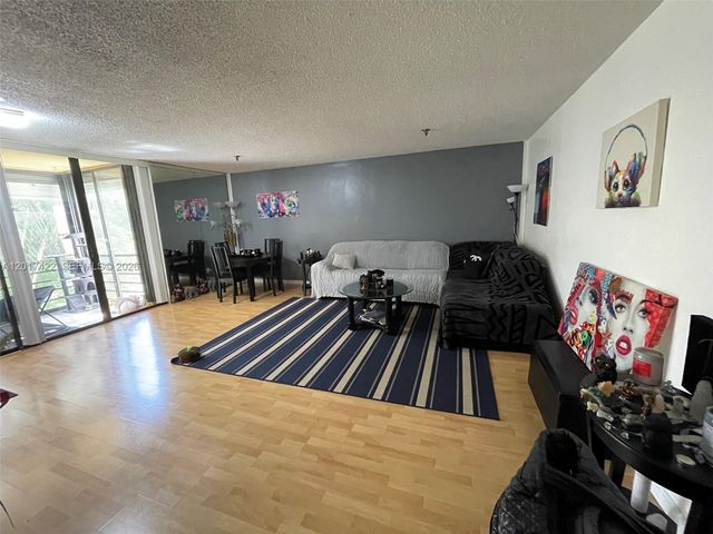 671 NE 195th St 207-E, Miami, FL 33179