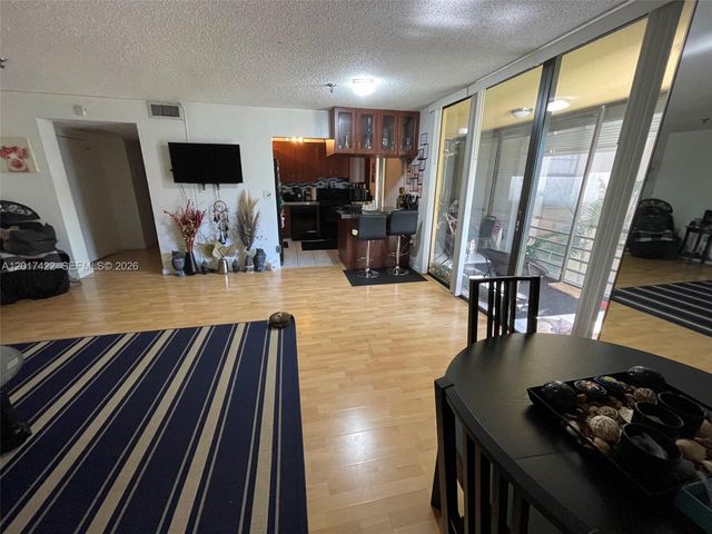 671 NE 195th St 207-E, Miami, FL 33179