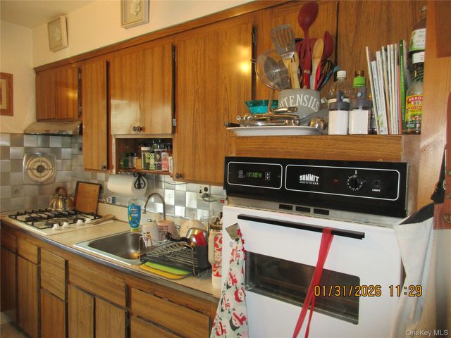 62-37 69TH Place, Middle Village, NY 11379