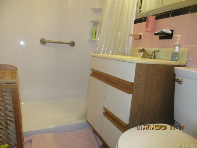 62-37 69TH Place, Middle Village, NY 11379