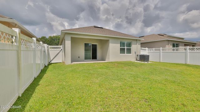 349 Caryota Court, New Smyrna Beach, FL 32168