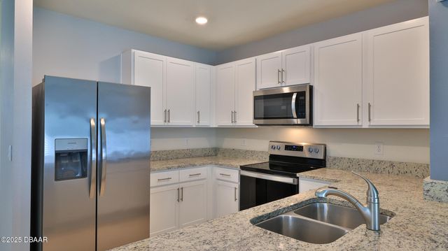 349 Caryota Court, New Smyrna Beach, FL 32168