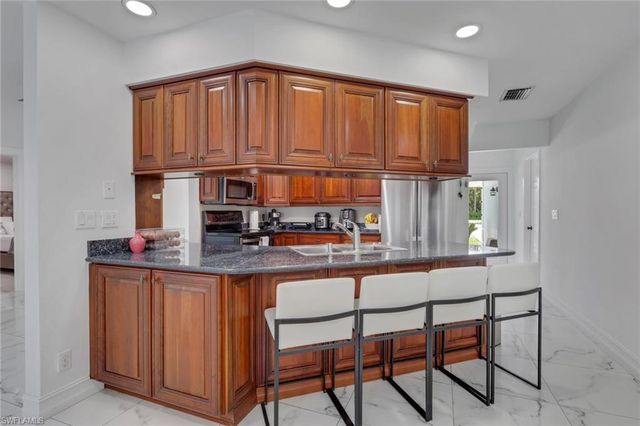 521 31st ST SW, Naples, FL 34117