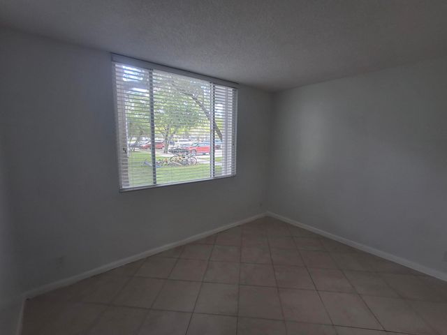 741 LYONS Road 17107, Coconut Creek, FL 33063