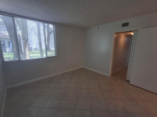 741 LYONS Road 17107, Coconut Creek, FL 33063