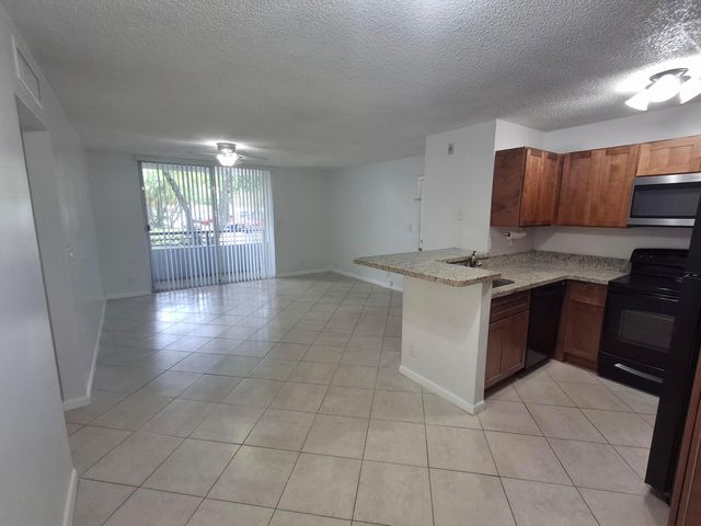 741 LYONS Road 17107, Coconut Creek, FL 33063