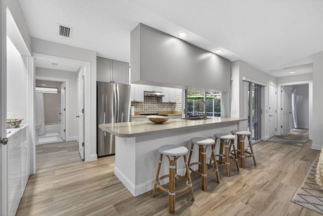 7502 Geminata Oak Court, Palm Beach Gardens, FL 33410