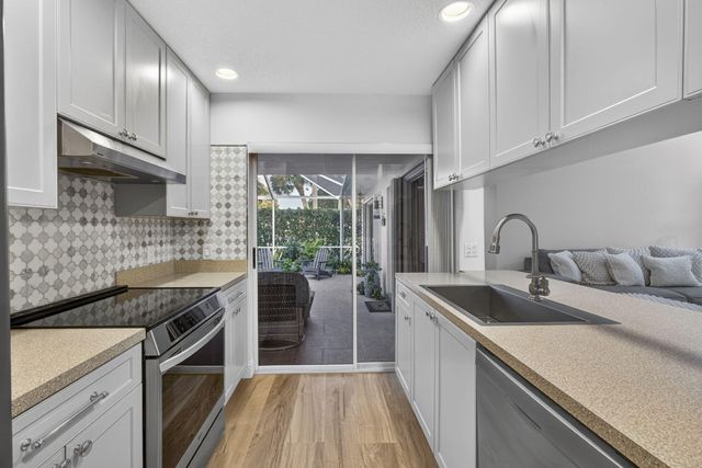 7502 Geminata Oak Court, Palm Beach Gardens, FL 33410