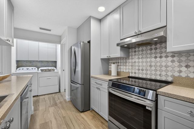 7502 Geminata Oak Court, Palm Beach Gardens, FL 33410