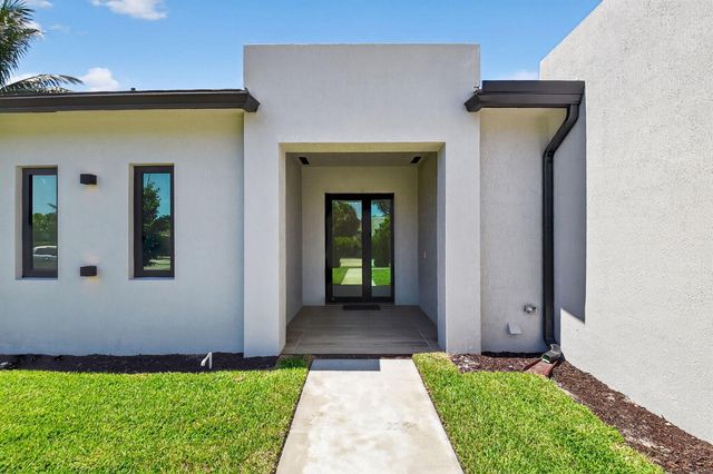 3920 Espan Court, Palm Springs, FL 33461