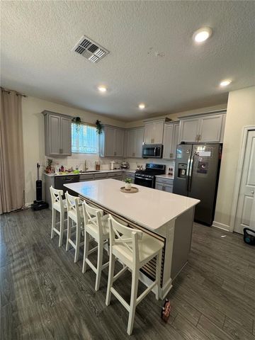 1512 OAK MARSH LOOP, Davenport, FL 33837