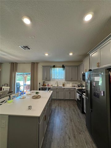 1512 OAK MARSH LOOP, Davenport, FL 33837