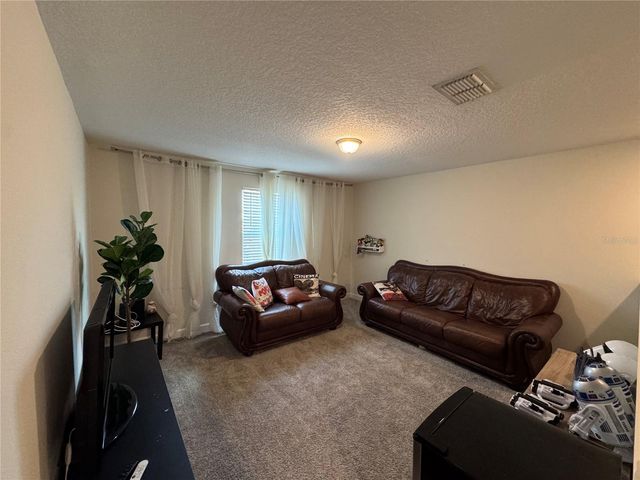 1512 OAK MARSH LOOP, Davenport, FL 33837