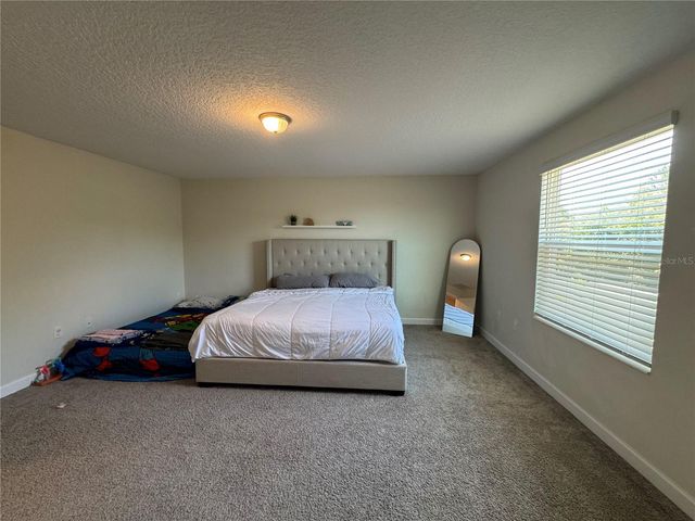 1512 OAK MARSH LOOP, Davenport, FL 33837